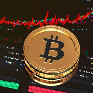 Imagem de uma moeda dourada com o símbolo do bitcoin dentro. Ao fundo alguns gráficos.